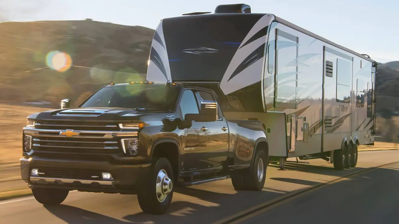 2023 Chevy Silverado 3500 towing a trailer.
